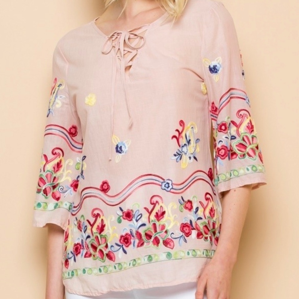 Mauve Boho top with multi color embroidery.